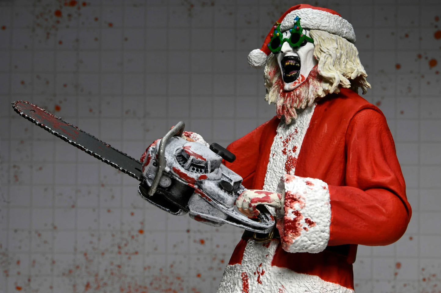 NECA Terrifier 7" Scale Action Figures - Terrifier 3 - Ultimate Santa Suit Art The Clown (Bloody Version) PREORDER