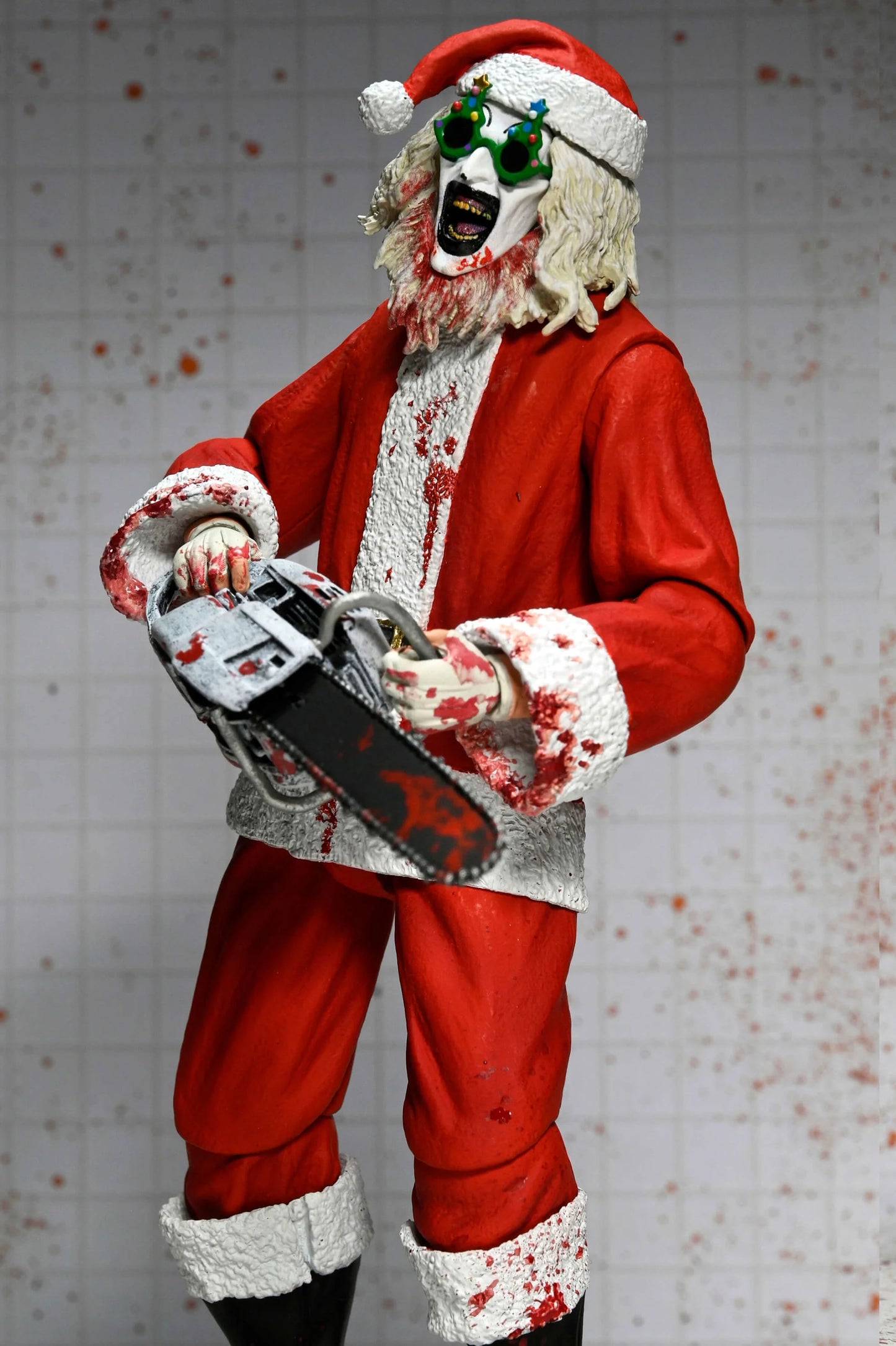 NECA Terrifier 7" Scale Action Figures - Terrifier 3 - Ultimate Santa Suit Art The Clown (Bloody Version) PREORDER